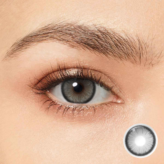 Transform your look with Magister Diamond Allure Gray Colored Contacts. These lenses will give you bigger, sexier, and deeper eyes, adding a touch of mystery and elegance.