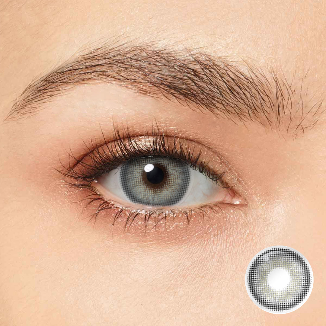 Introducing Magister Iris Cool Gray Colored Contacts - the perfect way to add a touch of shine to your eyes. 