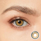 Enhance your natural beauty with Magister Iris Vanilla Brown Colored Contacts. These contacts feature a smooth outer ring and a unique sun-shaped inner ring.