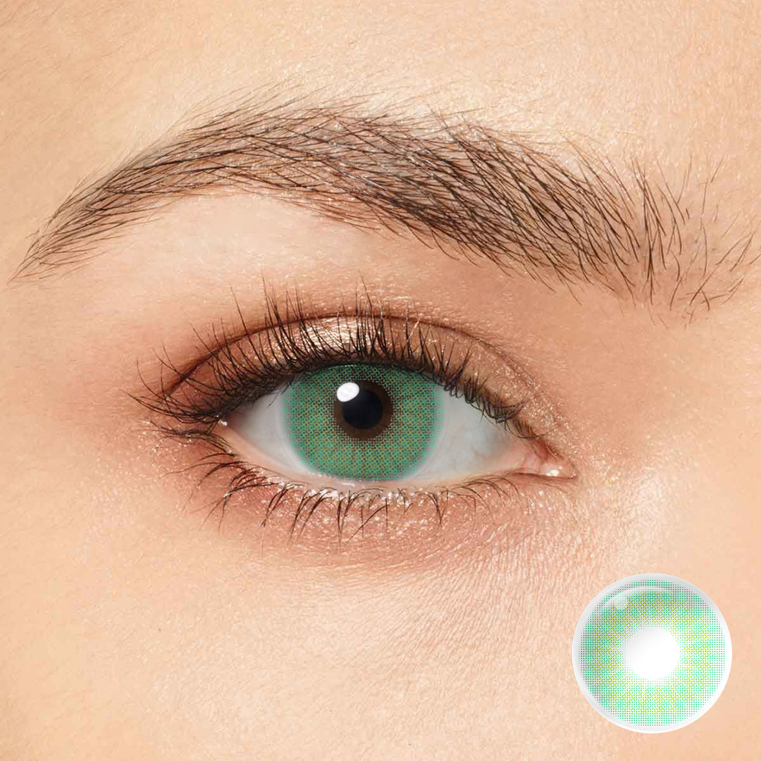 Unleash your bold and adventurous side with Magister Queen Emerald Colored Contacts. 